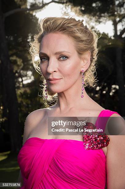 Uma Thurman poses for photographs at the amfAR's 23rd Cinema Against AIDS Gala at Hotel du Cap-Eden-Roc on May 19, 2016 in Cap d'Antibes, France.