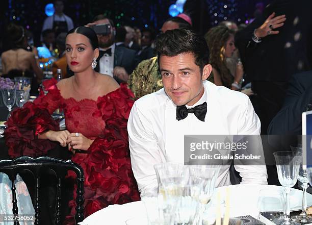 Musician Katy Perry and Actor Orlando Bloom attend the amfAR's 23rd Cinema Against AIDS Gala at Hotel du Cap-Eden-Roc on May 19, 2016 in Cap...