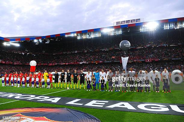 Liverpool and Sevilla players line up prior to the UEFA Europa League Final match between Liverpool and Sevilla at St. Jakob-Park on May 18, 2016 in...