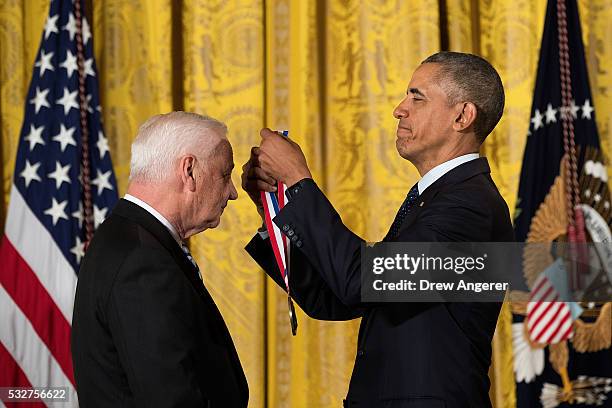 Dr. Stanley Falkow, from Stanford University School of Medicine, receives the National Medal of Science from President Barack Obama, during a...