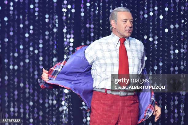 Actor Kevin Spacey performs on stage during the amfAR's 23rd Cinema Against AIDS Gala on May 19, 2016 at the Hotel du Cap-Eden-Roc in Cap d'Antibes,...