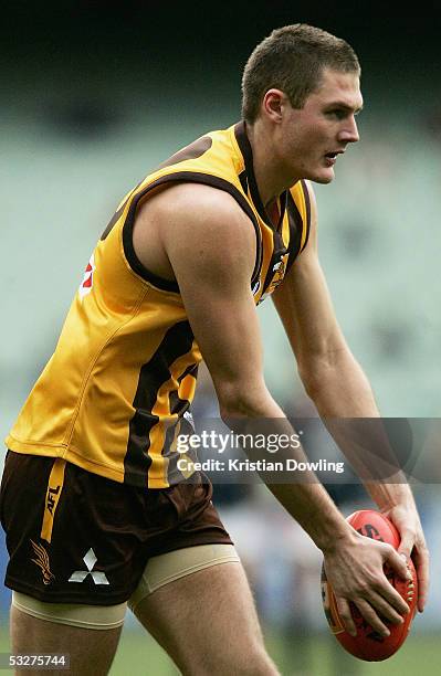 Simon Taylor for the Hawks in action during the round seventeen AFL match between the Hawthorn Hawks and Carlton Blues at the MCG on July 23, 2005 in...