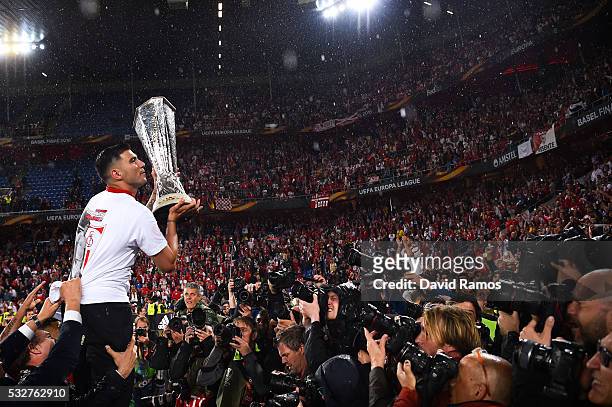 Team captain Jose Antonio Reyes of Sevilla FC poses for photographers with the trophy after the UEFA Europa League Final matach between Liverpool and...