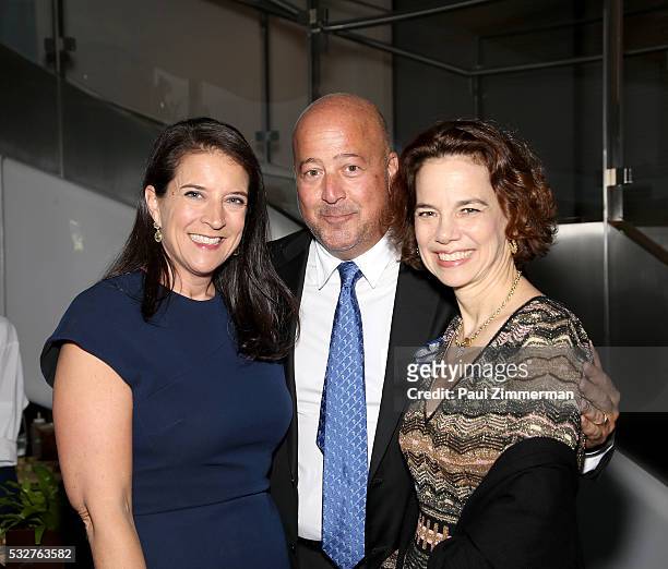 Honoree Christina Grdovic, chef Andrew Zimmern and honoree Dana Cowin pose at the Celebrity Chef Andrew Zimmern Hosts "Dinner For A Better New York"...
