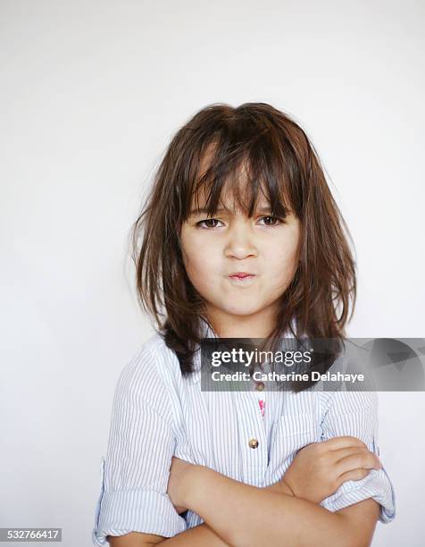 a 4 years old girl sulking - grumpy stock-fotos und bilder