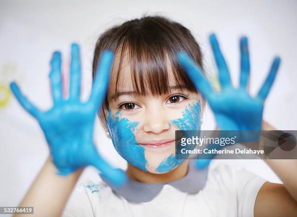 a 4 years old girl with paint on her hands - 2 3 years stock pictures, royalty-free photos & images