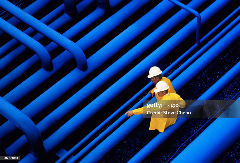 Oil Workers in Discussion