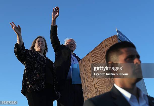 Democratic presidential candidate Sen. Bernie Sanders and his wife Jane O'Meara Sanders greet supporters during a campaign rally at Waterfront Park...