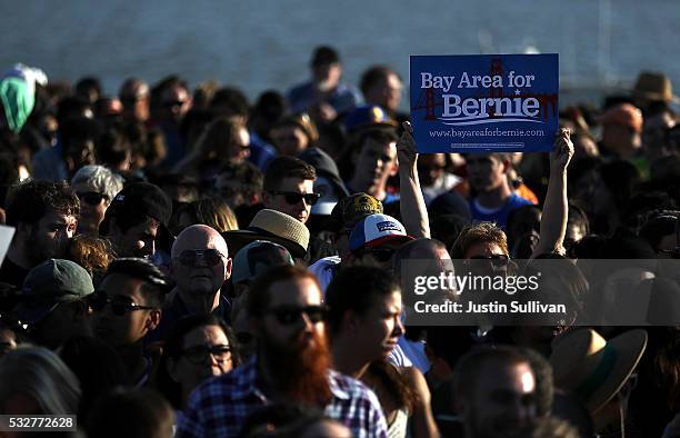 Supporter of democratic presidential candidate Sen. Bernie Sanders holds a sign during a campaign rally at Waterfront Park on May 18, 2016 in...