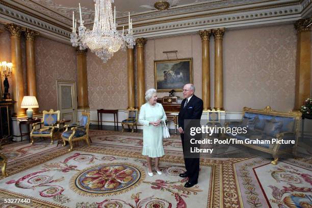 Queen Elizabeth II, The Queen, grants an audience to Australian Prime Minister John Howard at Buckingham Palace on July 22, 2005 in London, England.