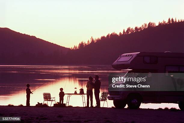 family camping at lake in rv - archival camping stock pictures, royalty-free photos & images