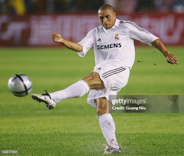 Roberto Carlos of Real Madrid in action during an exhibition match against Beijing Hundai on July 23 China. Real Madrid won the match by 3-2.