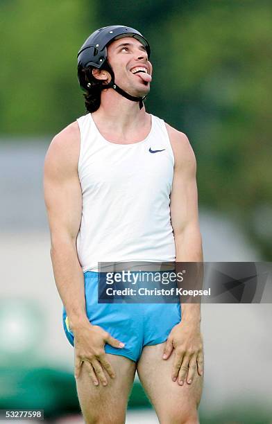 Toby Stevenson of the United States sticks out his tongue after a succesfull jump in the Men's Pole Vault during the track and field Bayer Meeting on...