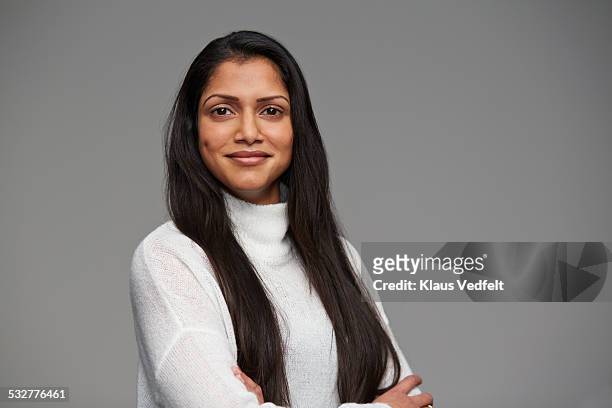 portrait of cool woman with crossed arms - only women stock pictures, royalty-free photos & images