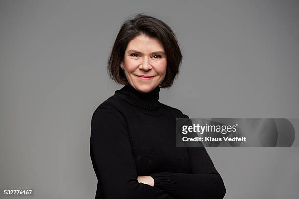 portrait of powerful mature woman - brown hair isolated stock pictures, royalty-free photos & images