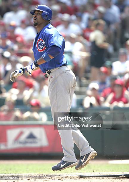 Derrek Lee of the Chicago Cubs watches a two-run home run leave the park in the 5th inning against the St. Louis Cardinals at Busch Stadium on July...