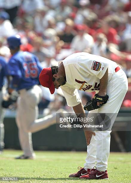 Matt Morris of the St. Louis Cardinals reacts after giving up a two-run home run to Derrek Lee of the Chicago Cubs in the 5th inning at Busch Stadium...