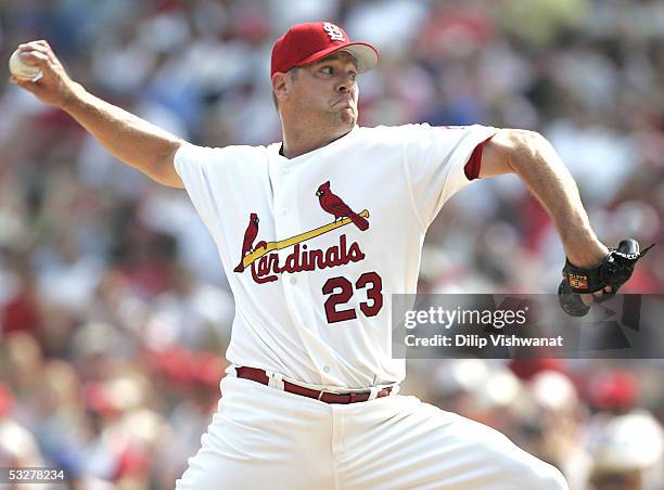 Cal Eldred of the St. Louis Cardinals pitches in relief against the Chicago Cubs at Busch Stadium on July 23 2005 in St. Louis, Missouri. The Cubs...