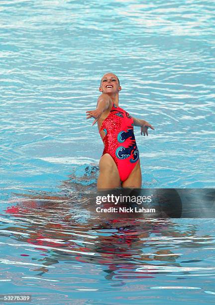 The synchronized swimming team from the United States performs in the team free final during the XI FINA World Championships at the Parc Jean-Drapeau...