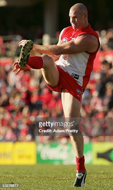 Barry Hall of the Swans kicks a goal during the round 17 AFL match between the Sydney Swans and the West Coast Eagles at the Sydney Cricket Ground...
