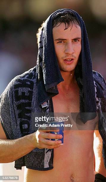Tadhg Kennelly of the Swans feels the heat during the round 17 AFL match between the Sydney Swans and the West Coast Eagles at the Sydney Cricket...