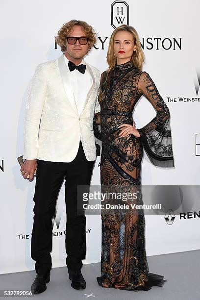 Peter Dundas and Natasha Poly attend the amfAR's 23rd Cinema Against AIDS Gala at Hotel du Cap-Eden-Roc on May 19, 2016 in Cap d'Antibes, France.