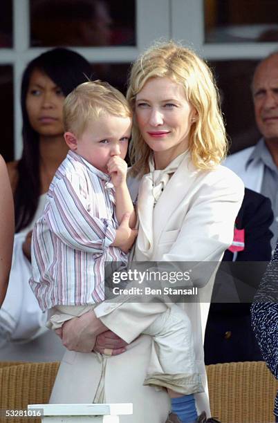 Actress Cate Blanchett watches with her son Dashiell on Cartier International Day at Guards Polo Club, Windsor Great Park on July 24, 2005 in...