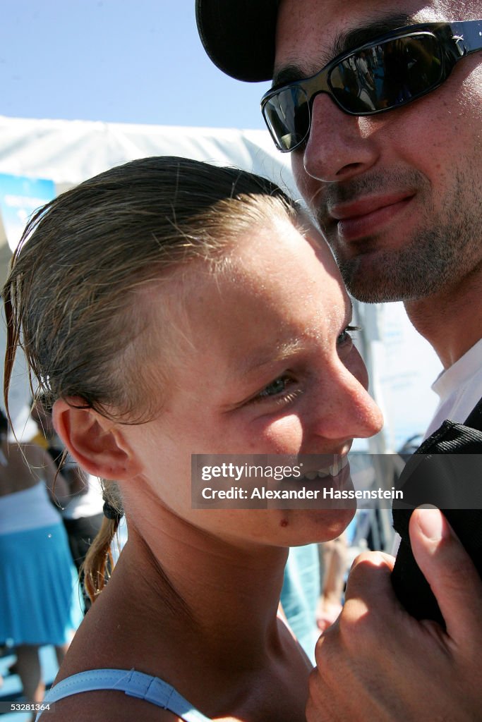 Ditte Kotzian hugs Rafed Al Masri after winning the silver medal with