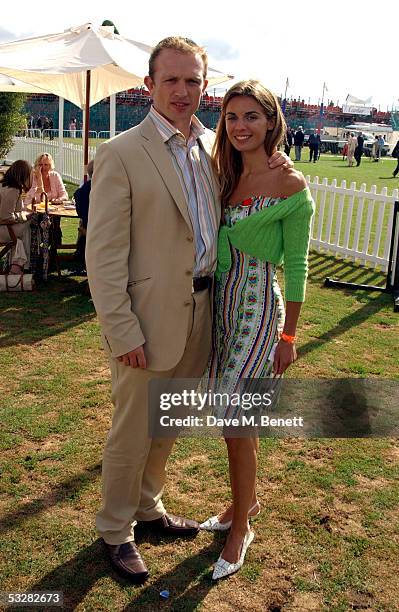 Rugby player Matt Dawson of the Lions and guest attend the Cartier International Day at Guards Polo Club, Windsor Great Park on July 24, 2005 in...