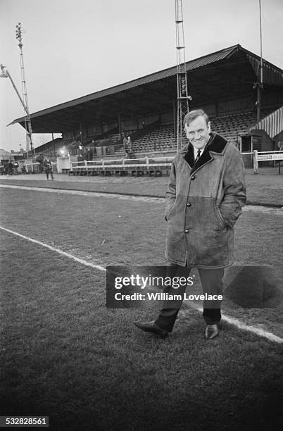 English footballer and manager Don Revie examines the pitch at the Borough Sports Ground on the eve of the Leeds United F.C. V Sutton United F.C. FA...