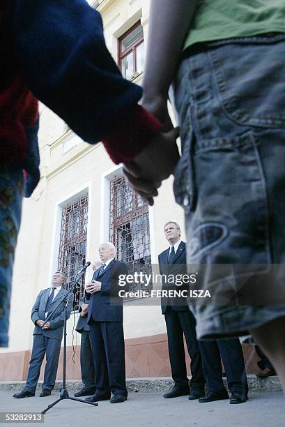 Hungarian President Ferenc Madl talks to members of the Hungarian community in Romania during a two-day non-official visit to Valea Lui Mihai in...