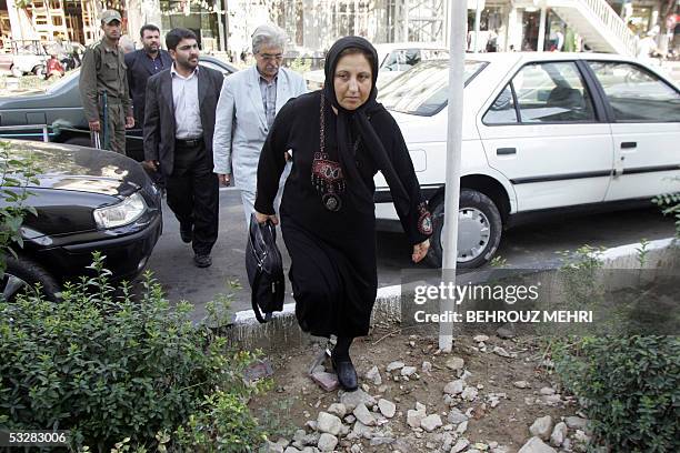 Iranian lawyer and Nobel peace laureate Shirin Ebadi and her colleague Mohammad Seifzadeh arrive at court to attend the appeal over the murder of...