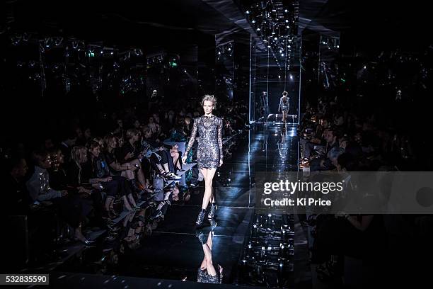 Models on the catwalk for Tom Ford in London, part of London Fashion Week ss14 on Monday 15 September, 2013.