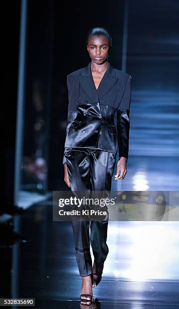 Models on the catwalk for Tom Ford in London, part of London Fashion Week ss14 on Monday 15 September, 2013.