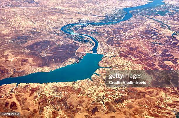 river dry mountains - euphrates river stock-fotos und bilder