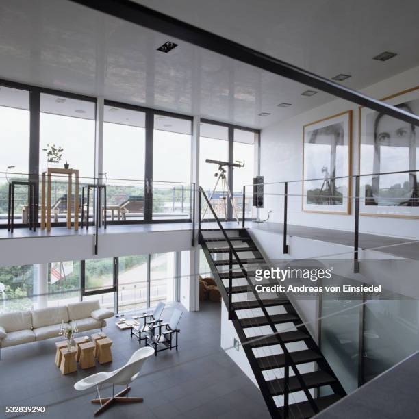 german penthouse with minimalist design - charles eames stock-fotos und bilder