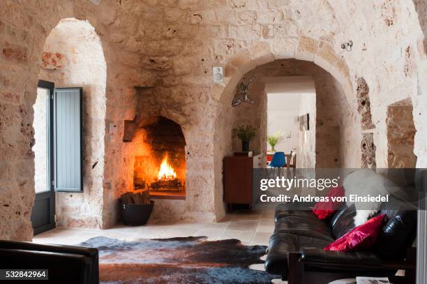 traditional trullo in puglia, italy - cave fire stock pictures, royalty-free photos & images