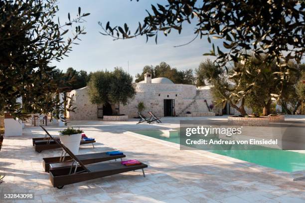 traditional trullo in puglia, italy - italian villa stock pictures, royalty-free photos & images