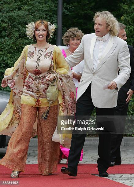 German entertainer Thomas Gottschalk and his wife Thea arrive for the opening performance of Richard Wagner's "Tristan and Isolde", on the first day...