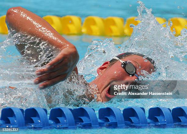 Flavia Rigamonti of Switzerland competes in the 1500 meter Freestyle preliminary heats at the XI FINA World Championships at the Parc Jean-Drapeau on...
