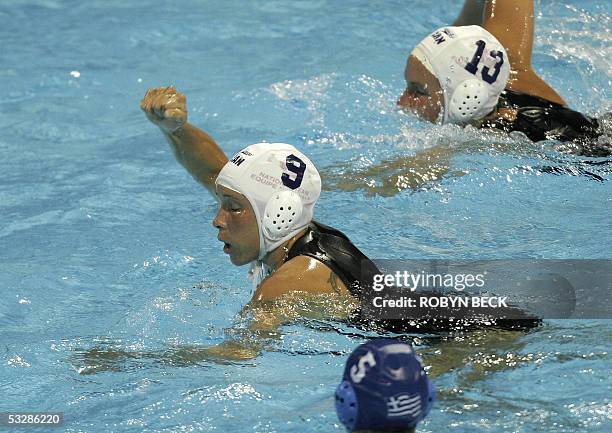 Captain Ann Dow of Canada celebrates her goal against Greece during their quarterfinal women's water polo match at the XI FINA World Championships 25...