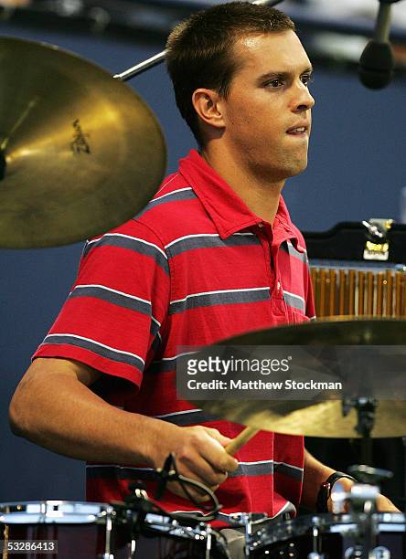 Tennis player Mike Bryan performs during Gibson/Baldwin "Night At The Net" charity event on July 25, 2005 in Straus Stadium at the Los Angeles Tenis...