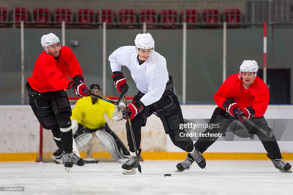 Front View of Ice Hockey Players in the Action