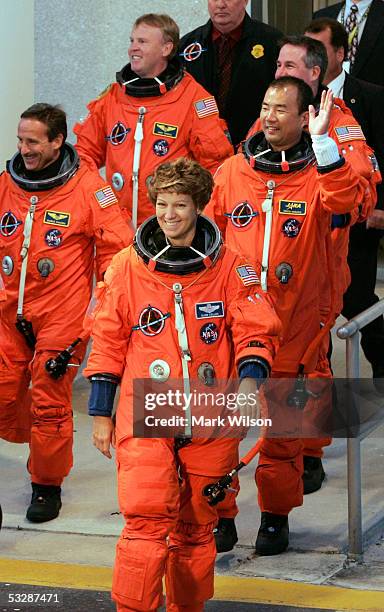 Space Shuttle Discovery astronauts Charles Camarda, Andrew Thomas, commander Eileen Collins, Soichi Noguchi, of the Japanese space agency JAXA, and...