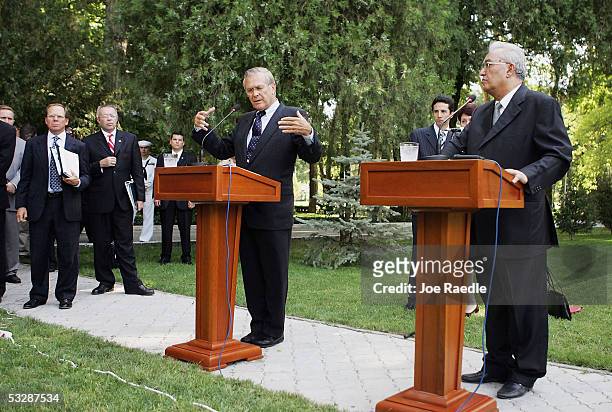 Secretary of Defense Donald Rumsfeld gestures as he speaks during a joint press conference with Tajikistan Minister of Foreign Affairs, Talbak...