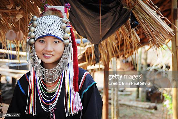 Akha woman in northern Thailand. The Akha are an indigenous hill tribe who live in small villages at higher elevations in the mountains of Thailand,...