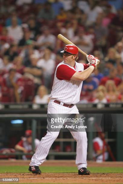 Outfielder Adam Dunn of the Cincinnati Reds at bat against the Colorado Rockies during the MLB game on July 16, 2005 at Great American Ballpark in...