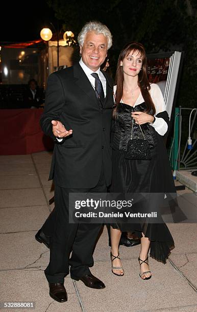 Mostra internazionale D'arte Cinematografica di Venezia. Cena di gala sulla spiaggia del Hotel EXCELSIOR Michele Placido e compagna FEDERICA VINCENTI