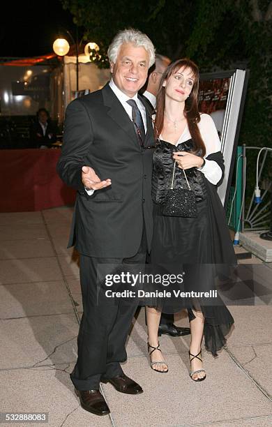 Mostra internazionale D'arte Cinematografica di Venezia. Cena di gala sulla spiaggia del Hotel EXCELSIOR Michele Placido e compagna FEDERICA VINCENTI