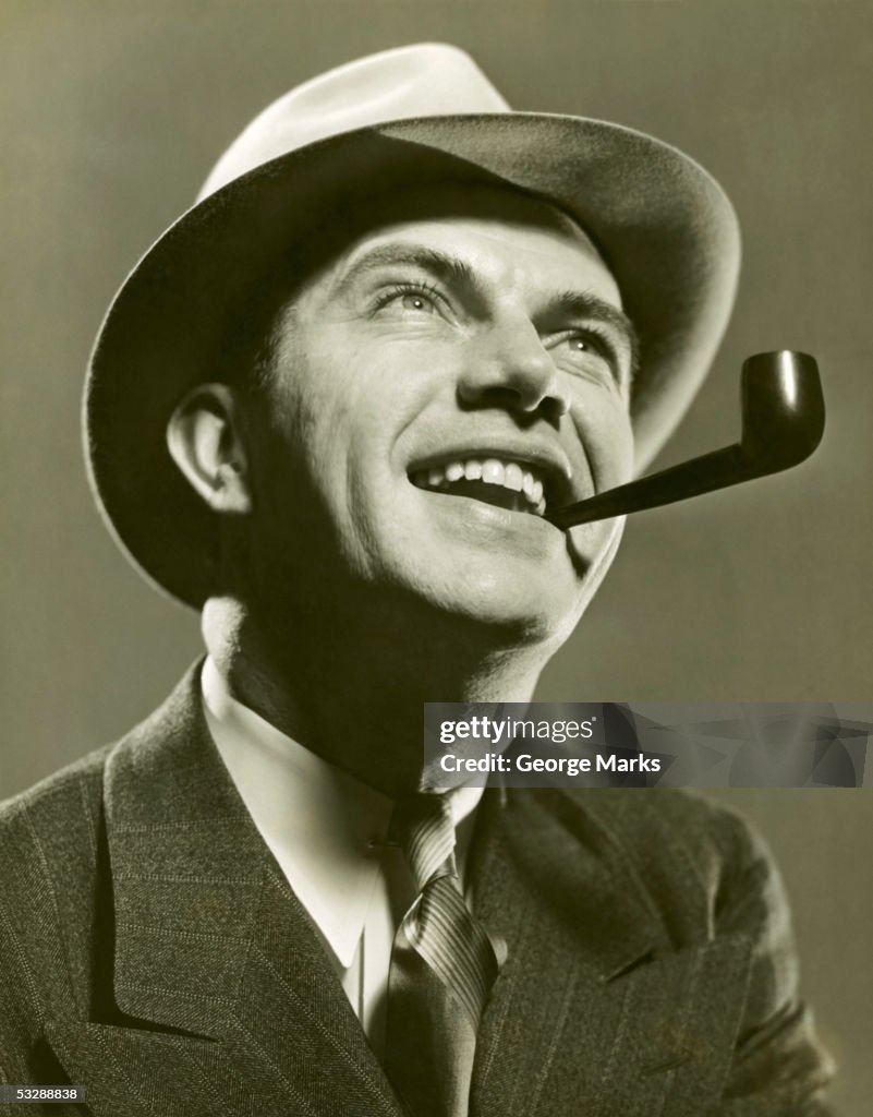 Man with pipe in mouth